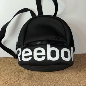 Reebok Womens Cottie Mini Backpack Neoprene Black with White Letter